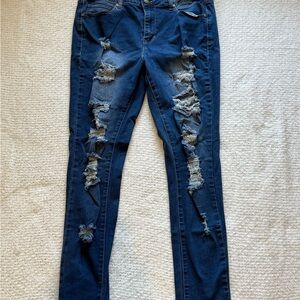 Medium Blue Distressed Skinny Jeans with Raw Edges